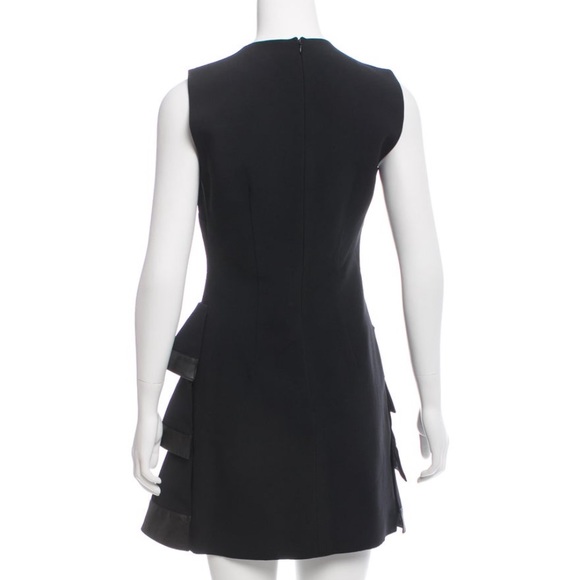 Emanuel Ungaro
Leather-Trimmed Ruffled Dress
Size: MIUS8, FR40 color Black - Picture 3 of 9
